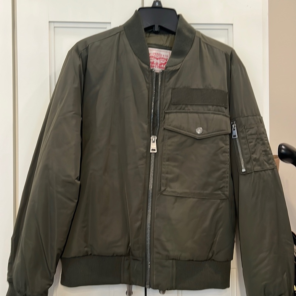 Brand new with tags Levi’s army, green bomber, jacket, size small women’s.